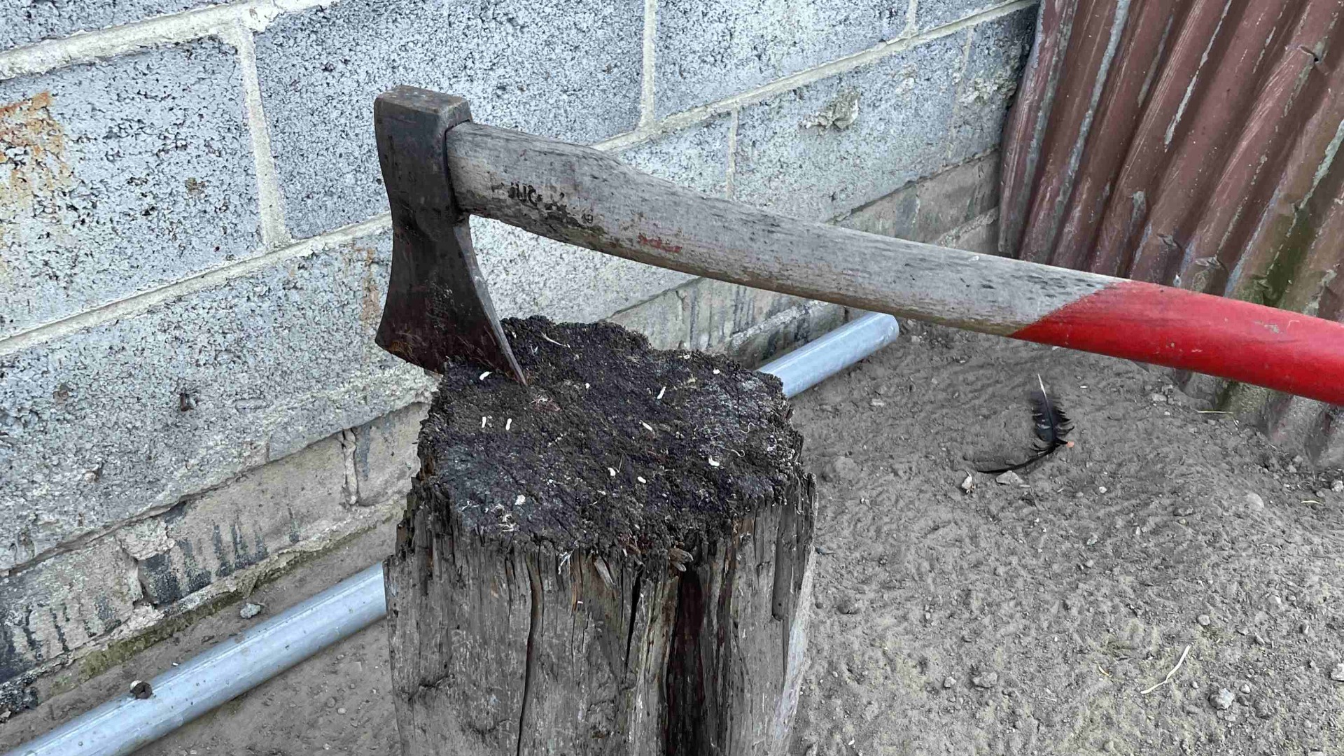 Axe on a wooden block